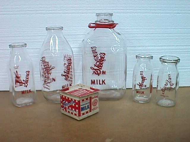 Spring Decor with Old Milk Bottles and Vintage Milk Caps